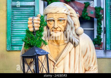 Scrooge standing outside haunted attraction at the Christmas funfair, Winter Wonderland, in London Stock Photo