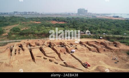 Nanchang. 8th Dec, 2019. Aerial photo taken on August 23, 2019 shows the ancient tombs excavated in Ganjiang New District, Nanchang, east China's Jiangxi Province. Archaeologists have excavated 73 ancient tombs dating back 1,400 years ago in east China's Jiangxi Province, the local institute of cultural relics and archeology said Saturday. It is believed that the majority of the discovered tombs were built in the Six Dynasties (222-589). The 8,000-square-meter site was discovered in June 2013. Excavation started in August 2018. Credit: Xinhua/Alamy Live News Stock Photo