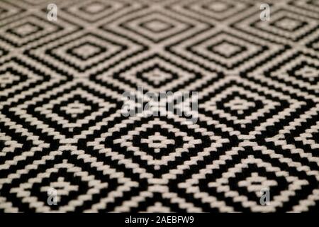Closeup the Texture of Black and White Colored Ethnic Pattern Fabric Stock Photo