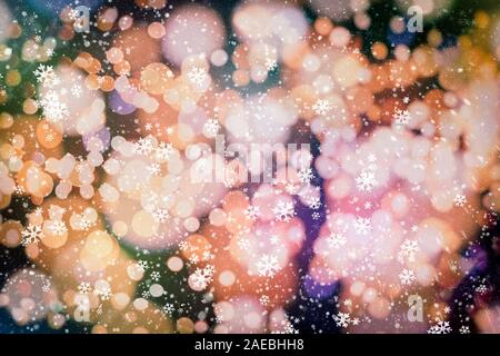 Sparse snowfall Christmas background. Subtle flying snow flakes and stars on background Stock Photo
