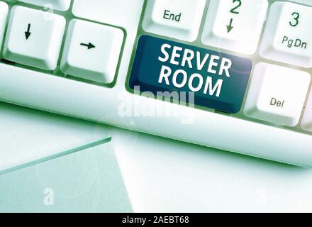 Conceptual hand writing showing Server Room. Concept meaning a room used to store power and operate computer servers White pc keyboard with note paper Stock Photo