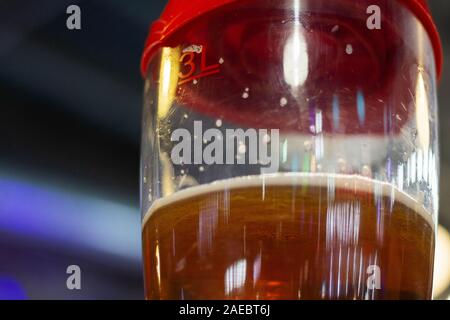 tower of beer . 3 liters .a big group of people at the holiday party Stock Photo