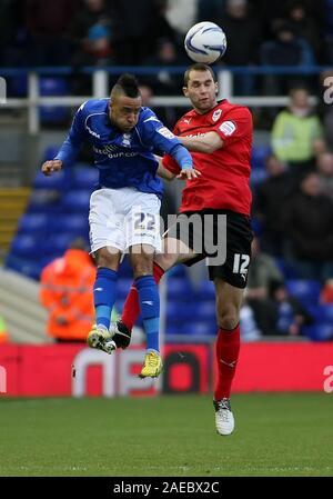 1st January 2013 - nPower Championship - Birmingham City Vs. Cardiff City - Nathan Redmond of Birmingham City heads clear from Matthew Connolly of Cardiff City  - Photo: Paul Roberts /Oneuptop/Alamy. Stock Photo