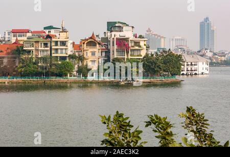 View across West Lake in Ho Tay District with hazy smog, Hanoi, Vietnam, Southeast Asia Stock Photo