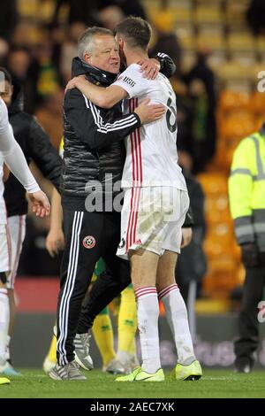 Norwich, UK. 08th Dec, 2019. Sheffield United managerÊChris Wilder hugs Chris Basham of Sheffield United at the end of the match during the Premier League match between Norwich City and Sheffield United at Carrow Road on December 8th 2019 in Norwich, England. (Photo by Mick Kearns/phcimages.com) Credit: PHC Images/Alamy Live News Stock Photo