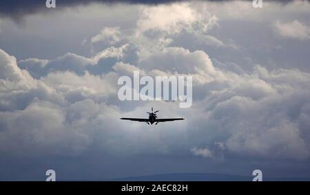 A large single engine private aircraft taking off from a small regional ...