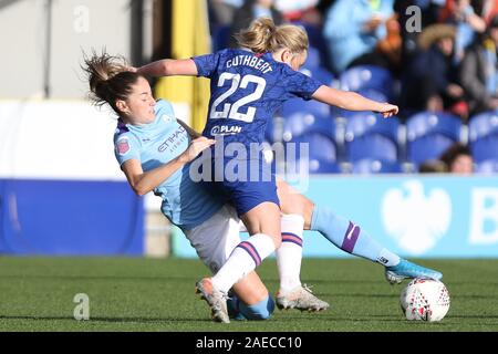 Kingston, UK. 17th Nov, 2019. Gemma Bonner of Manchester City Women slide tackling Erin Cuthbert of Chelsea Ladies during the Barclays FA Women's Super League match between Chelsea and Manchester City at the Cherry Red Records Stadium, Kingston on Sunday 8th December 2019. (Credit: Jacques Feeney | MI News) Photograph may only be used for newspaper and/or magazine editorial purposes, license required for commercial use Credit: MI News & Sport /Alamy Live News Stock Photo