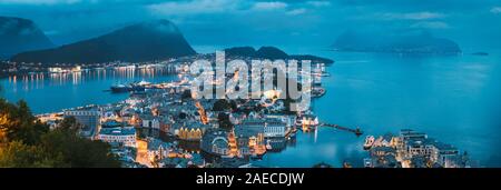 Alesund, Norway - June 21, 2019: Night View Of Alesund Skyline Cityscape. Historical Center In Summer Evening. Famous Norwegian Landmark And Popular D Stock Photo