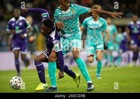 BRUSSELS, BELGIUM - December 08: Jeremy Doku of Anderlecht and Maxime Busi  of Charleroi fight for the ball during the Jupiler Pro League match day 18  between Rsc Anderlecht vs Sporting Charleroi