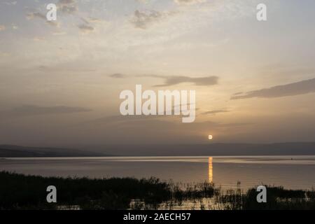 Sunrise at the Sea of Galilee.  The Sea of Galilee is one of the most familiar bodies of water in the Bible, especially to readers of the Gospels. Stock Photo