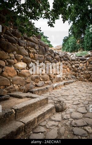 Behind it, along the wall, is a stone bench - on which the elders of the city sat. This custom is referred in several Biblical passages. Stock Photo