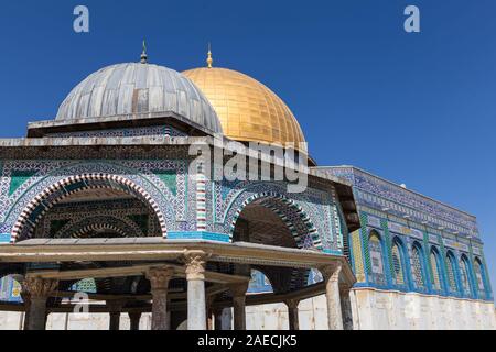 In Jerusalem, The Dome of Chain is a domed hexagon with open arches,  is adjacent to the Dome of Rock, and marks the exact center of the temple mount.