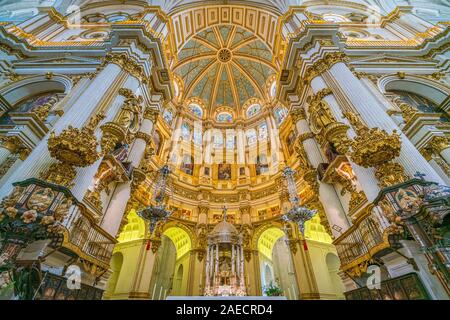 Majestic main altar in 'Our Lady of the Assumption' Cathedral in Granada. Andalusia, Spain, June-03-2019 Stock Photo