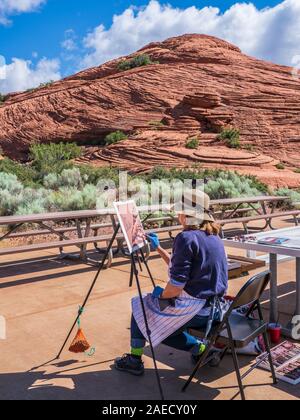 Painter at the Lower Galoot picnic site, Snow Canyon State Park, Saint George, Utah. Stock Photo