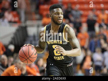 Stillwater, OK, USA. 8th Dec, 2019. Wichita State guard Jamarius Burton (2) dribble the ball during a basketball game between the Wichita State Shockers and Oklahoma State Cowboys at Gallagher-Iba Arena in Stillwater, OK. Gray Siegel/CSM/Alamy Live News Stock Photo