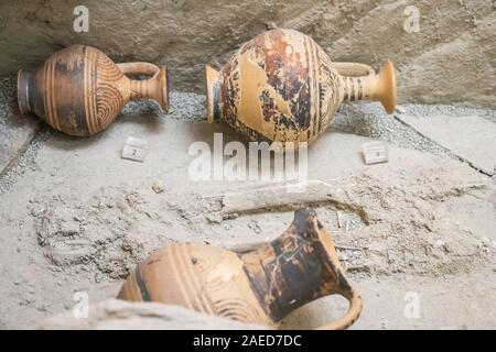 Small ancient greek lekythos decorated with groups of concentric semicircles Stock Photo
