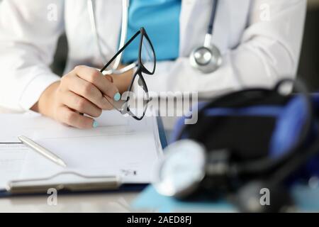 Family doctor at workplace in hospital Stock Photo