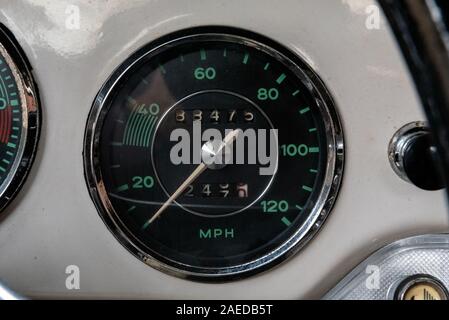 European engineering in classic cars had speedometer on dashboard of vintage cars with much different look than contemporary. Stock Photo