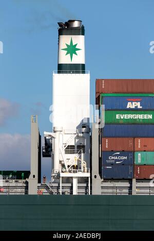 Funnel of the Evergreen container ship EVER GOODS. Evergreen headquartered in Taiwan is a global containerized-freight shipping company. Stock Photo