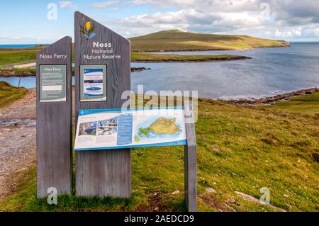 Signs on Bressay for the Noss Ferry and Noss National Nature Reserve, Shetland. Stock Photo