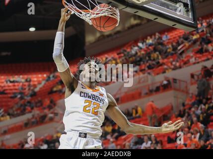 Stillwater, OK, USA. 8th Dec, 2019. Oklahoma State forward Kalib Boone (22) dunks the ball during a basketball game between the Wichita State Shockers and Oklahoma State Cowboys at Gallagher-Iba Arena in Stillwater, OK. Gray Siegel/CSM/Alamy Live News Stock Photo