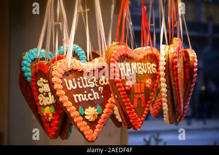 Hamburg, Germany - December 16, 2018: Traditional German handmade gingerbread heart used as gifts and Christmas decoration seen at Christmas market (W Stock Photo