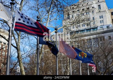 Flags wave on a windy day in Washington Square Park, Philadelphia, PA. Stock Photo