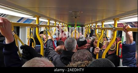 Overcrowded Manchester Metrolink Tram, Piccadilly, greater Manchester, Lancs, England, UK - Peak travel Stock Photo
