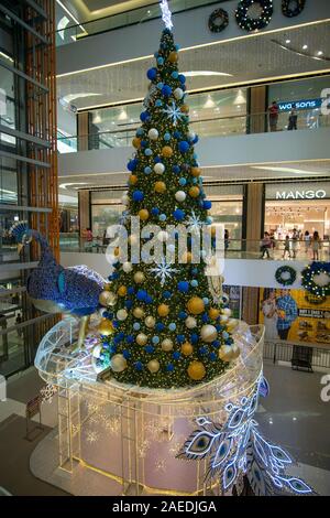 A Christmas tree incorporating a spectacular Peacock bird,SM Seaside shopping mall,Cebu City,Philippines Stock Photo