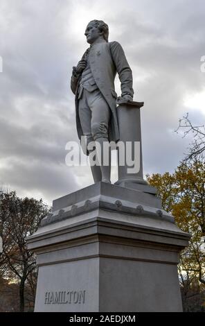 Alexander Hamilton statue in Central Park, New York City. It is carved from solid granite by Carl H. Conrads, was donated to Central Park in 1880 by o Stock Photo