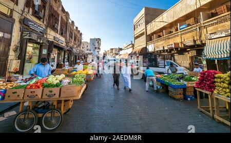 View of people at the Souk Baab Makkah street market at the historic district Al Balad in Jeddah, KSA, Saudi Arabia Stock Photo