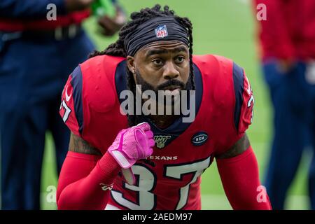 Houston, Texas, USA. 29th Dec, 2019. Tennessee Titans tight end MyCole  Pruitt (85) carries the ball upfield after a catch while Houston Texans  safety Jahleel Addae (37) defends during the third quarter