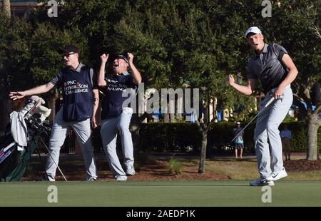 Bernhard Langer (right) and his son, Jason, pose with the