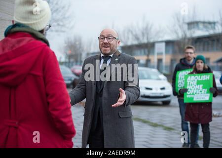 Glasgow, UK. 22 November 2019. Pictured: Patrick Harvie MSP - Co Leader of the Scottish Green Party campaigns with local candidates, councillors and party members for the abolition of the home office.  Credit: Colin Fisher/Alamy Live News. Stock Photo