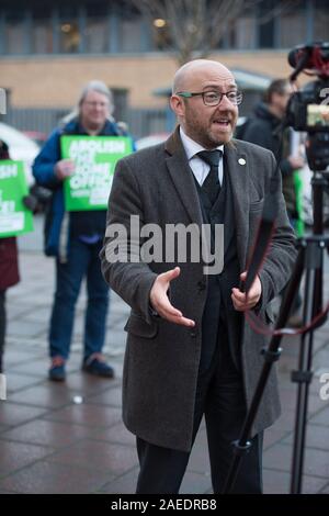 Glasgow, UK. 22 November 2019. Pictured: Patrick Harvie MSP - Co Leader of the Scottish Green Party campaigns with local candidates, councillors and party members for the abolition of the home office.  Credit: Colin Fisher/Alamy Live News. Stock Photo