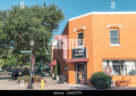 WINTER GARDEN, FLORIDA: MAY 29, 2019 - Tonys Liquors, an orange liquor store building  on the corner of Main and Plant street in downtown area. Stock Photo