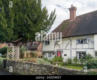 An ancient timber framed cottage and garden in the village of Weavering, Kent, UK Stock Photo