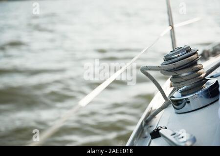 Sailboat winch and rope yacht detail. sunny day Stock Photo