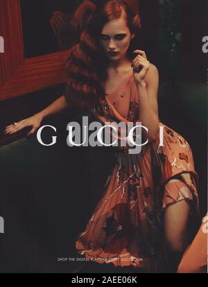 poster advertising GUCCI fashion house in paper magazine from 2012 year, advertisement, creative GUCCI 2010s advert Stock Photo