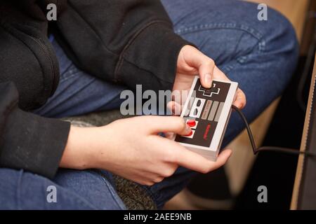 Nintengo NES,playing Super Mario 3 Stock Photo