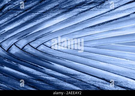 Abstract Texture of Palm Tree leaf in trendy blue color toning. Geometrical shape and lines. Tropical plant background. Stock Photo