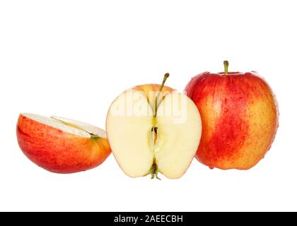 One whole gala apple with one sliced on facing forward isolated on white. Gala is a clonally propagated apple cultivar with a mild and sweet flavor. Stock Photo