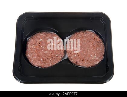 package of vegetable based burger patties, isolated on white. The first plant-based burger to be sold in the grocery store meat section. Stock Photo
