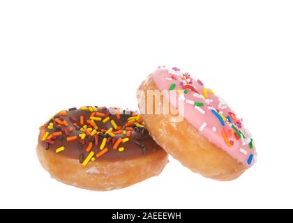Two cake donuts frosted one chocolate other strawberry both with candy sprinkles isolated on white. Stock Photo