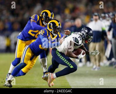 Los Angeles Rams free safety Eric Weddle knocks the ball away from  Baltimore Ravens tight end Mark Andrews during the second half of an NFL  football game Monday, Nov. 25, 2019, in