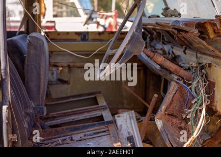 Close up of the inside of an old rusted and abandoned car Stock Photo
