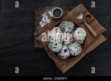 Chinese chives Dumplings Mixed Color or Garlic Chives Dim Sum Rice Cake inside with Taro Slice ,Bamboo shoot and Many kind of vegetable inside the flo Stock Photo