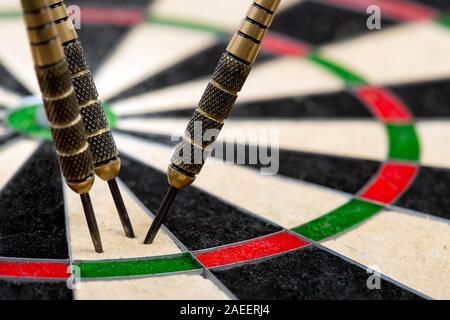 Dartboard with arrows close up Stock Photo