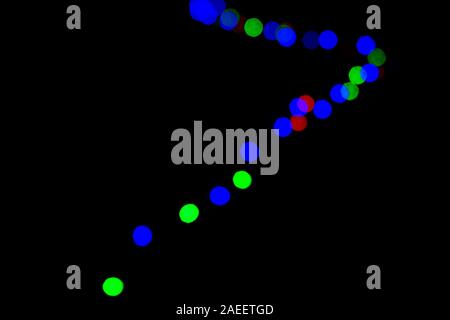 Beautiful bright blurred light on the dark of night Stock Photo
