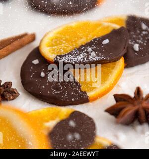 Image of homemade candied orange dipped in chocolate. Stock Photo